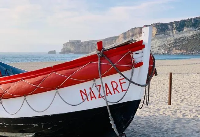 Апартаменты Sunset Terrace - Beachfront With Private Parking Назаре